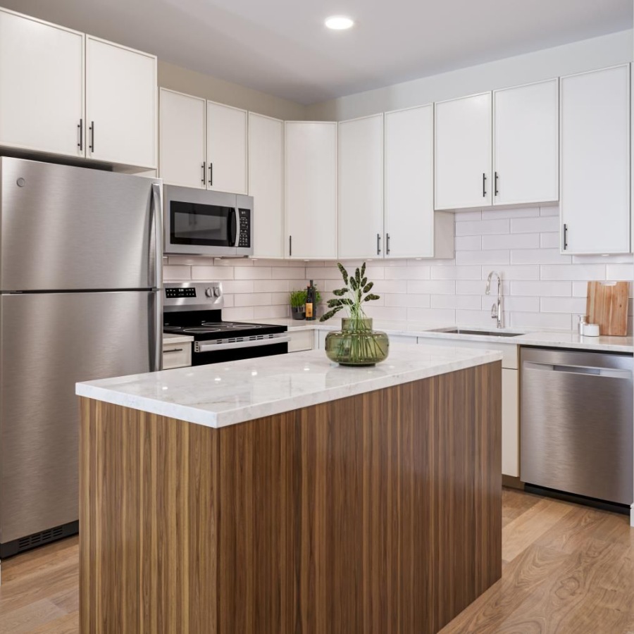 a kitchen with white cabinets